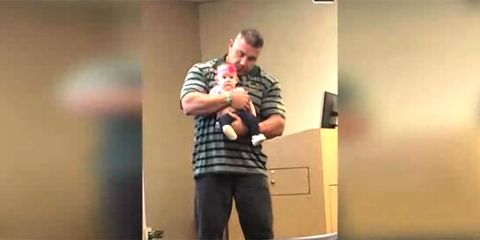 Baylor professor holds baby