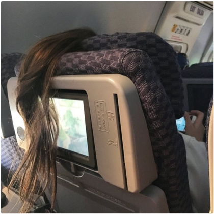 Hairstyle, Comfort, Service, Long hair, Airline, Public transport, Gadget, Head restraint, Air travel, Multimedia, 