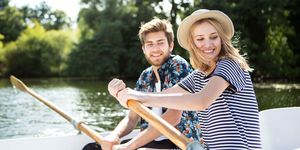 Hat, Recreation, Leisure, Happy, People in nature, Facial expression, Boats and boating--Equipment and supplies, Summer, Outdoor recreation, Watercraft, 