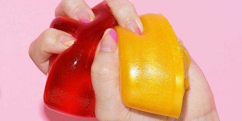 Finger, Yellow, Skin, Nail, Pink, Amber, Orange, Material property, Close-up, Tooth, 