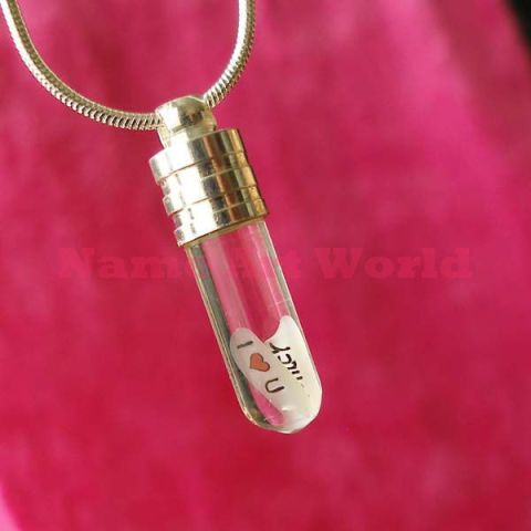Key ring with name on rice grain cylindrical shape with real flower