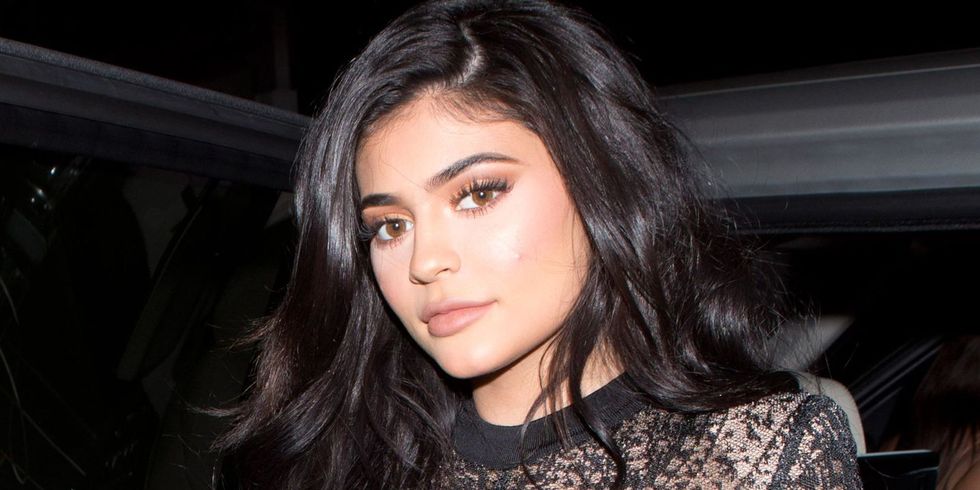 Kylie Jenner Wears Black Lace Balmain Catsuit To Birthday Party In West Hollywood 