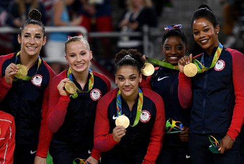 Smile, Facial expression, Celebrating, Team, Tradition, Hair accessory, Earrings, Makeover, Medal, Award, 