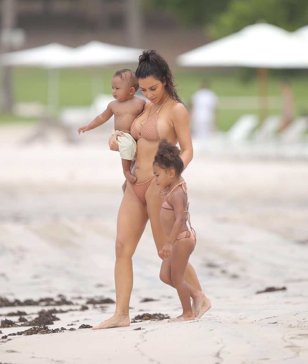 Kim Kardashian Wears Tiny Blue Bikini On Tropical Vacation