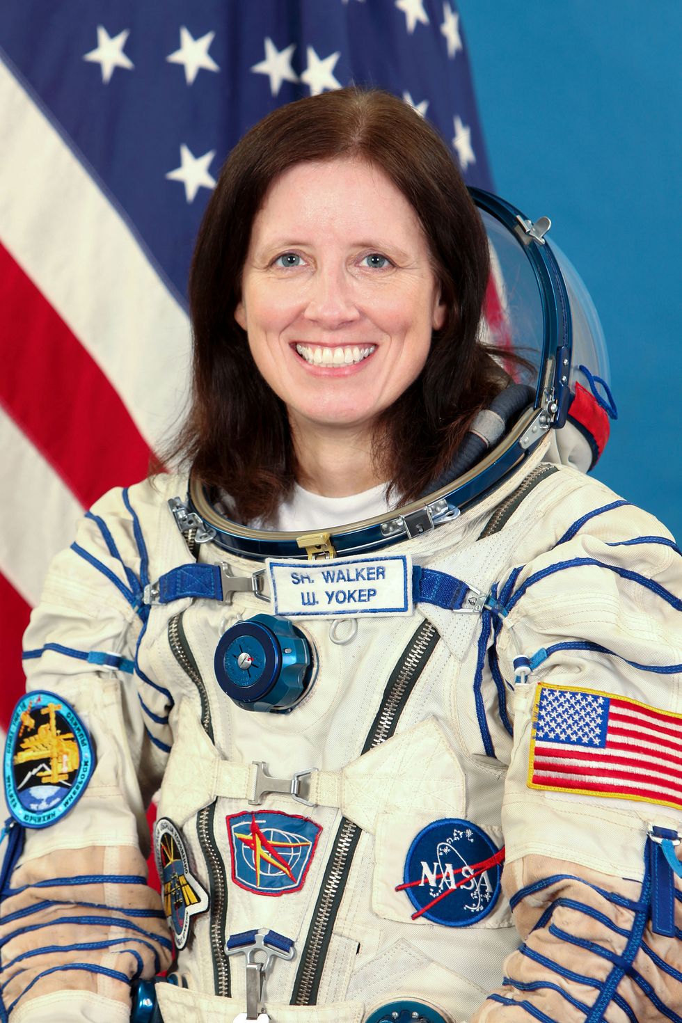 Smile, Uniform, Tooth, Electric blue, Space, Flag of the united states, Astronaut, Award, Pleased, Laugh, 