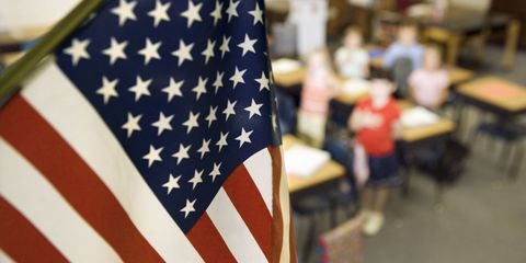 teacher punished for forcing student to stand during pledge