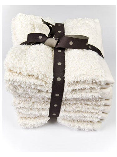 image Giving your man a foot rub probably doesn't fall too high on your list of favorite things to do, so the fact that you're even offering it lets him know just how much you care. Plus, it feels damn good. "We hold a lot of tension in our feet that connects to other spots on our bodies, so working out the kinks there can help relax us all over," says Jamie Ahn, owner of Townhouse Spa in New York City.<br /><br /> Her tips for giving the ultimate foot rub: First, pop a small, damp washcloth in the microwave for a minute. Find a cushy spot where you'll both feel comfortable, and have him lie down with his feet in your lap. Then use the toasty washcloth to cleanse his feet, which will warm the area and, for your sake, eliminate any foul odors.<br /><br /> Rub a half dollar-size dollop of an essential oil or body lotion in your hands, grasp the arch of his foot with one hand, and rotate the foot in circles, moving clockwise to the right, down toward you, up to the left, and back toward him to loosen up the joints and muscles. Next, take both thumbs and move them up the bottom of the foot, from the arches to the toe pads and outward. Repeat multiple times.<br /><br /> Between kneading moves, intermittently take your hands and gently glide them all over his foot and up and down his calf. Lastly, gently pull each toe. Then give the other foot the same treatment. Once you're finished, clean his feet once again with a warm, damp washcloth.