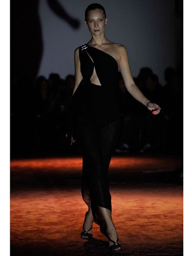 The one-shoulder dress is as hot now as it was 35 years ago. Zac Posen's version in sheer black pleated fabric is especially glamorous. Keep the look elegant with simple makeup and neatly pulled-back hair to show off that sexy shoulder.