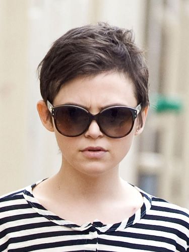 Cutler suggests asking your stylist to add a little height at the top with longer layers, similar to Ginnifer Goodwin's. This elongates the shape of your face. Then, blow dry your hair with a round brush or smooth a styling cream on damp hair and rake your fingers through to get texture, which balances out the gentle curves of your face.
