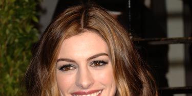 A pretty, rumpled style like Anne Hathaway wore to the Oscars is a great way to spice up basic long hair. And it's really simple—just mist in some texturizing spray and scrunch. 
