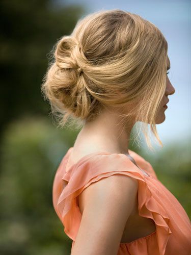 You know how you twist your hair when you're bored on a lazy day? That's the key trick to this style, according to NYC stylist Leon Gorman, who created the looks seen here. Make a low side ponytail, leaving a few pieces loose around your face. Twist the length of your ponytail, and wrap it into a figure-eight shape — smoosh it up against your scalp, and tuck the ends into the loop. Insert a few hairpins or tiny barrettes to lock it all in place. Finish with a mist of lightweight hair spray that'll give you extra hold minus any stickiness. We like <a href="http://www.paulmitchell.com/Products/PaulMitchell/ExpressStyle/Pages/WorkedUp.aspx" target="_blank">Paul Mitchell Worked Up</a>, $14.95.