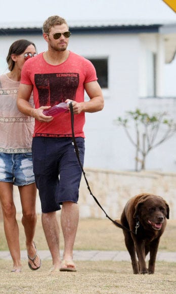 image Known for adopting new dogs, this doggy and Kellan look like a match made in heaven.