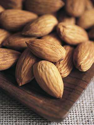 Almonds and pistachios are great, non-bloating snacks—provided they’re unsalted, says Bauer. Their high-protein count also helps you feel fuller, faster.