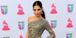 <p>Model and TV Personality Alejandra Espinoza worked the red carpet in this patterned dress. If we had to give an award for the most unique dress (in a good way), she'd take the title!</p>