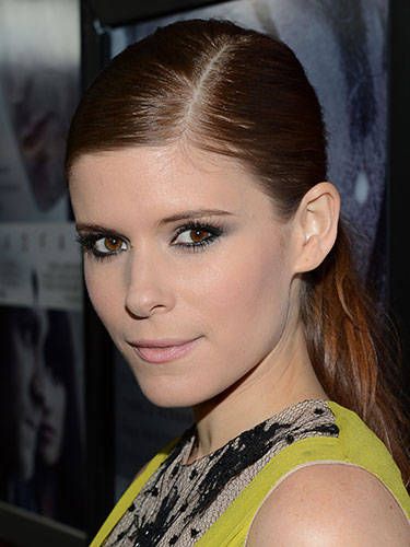 At the premiere of <i>Deadfall</i>, the redhead vamped it up in grey-rimmed smokey eyes and pale, Sixties-esque lips.