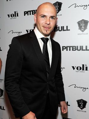 <p>The man with the ultimate swag, <em>Cubano</em> Pitbull. You can't deny that his tailored tuxes and hip-shaking tracks make him three million times hotter. We'd just have to worry about seriously amping up our date-night look with this <em>guapo</em>.</p>