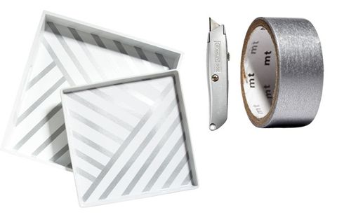 <p>Stencil a design using a ruler and chalk (or eyeball it!), then cover lines with long strips of metallic tape. Using a box cutter, slice the tape so it lies flush against any edges. TIP: Rectangular trays work better than round ones.</p>
<p><strong>Your Toolbox</strong></p>
<p>• White serving tray<br /> • Metallic masking tape<br /> • Box cutter</p>