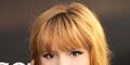 <p>Starlet Bella Thorne looks beyond romantic in this thick, ropy plait with bangs. Leave loose, face-framing tendrils for an extra dose of hotness.</p>