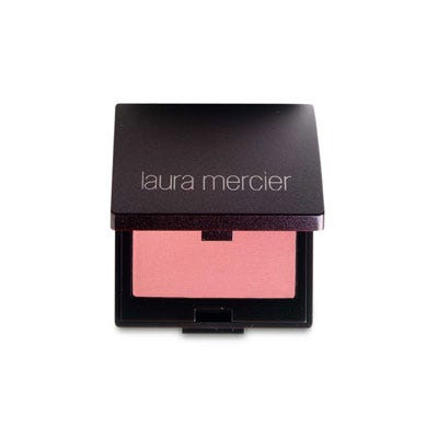 <p>When you smile, the apple of your cheek pops out. Place your blush right there and blend into your temple — this will make it look like you're naturally flushing.</p> <p>Laura Mercier Second Skin Cheek Colour, $24; <a href="http://www.lauramercier.com/store/shop/Blush_Second-Skin-Cheek-Colour_prod190034" target="_blank">lauramercier.com</a></p>