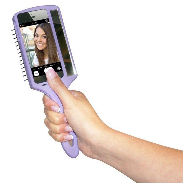 Someone has invented a Selfie Brush because THIS IS THE WORLD WE