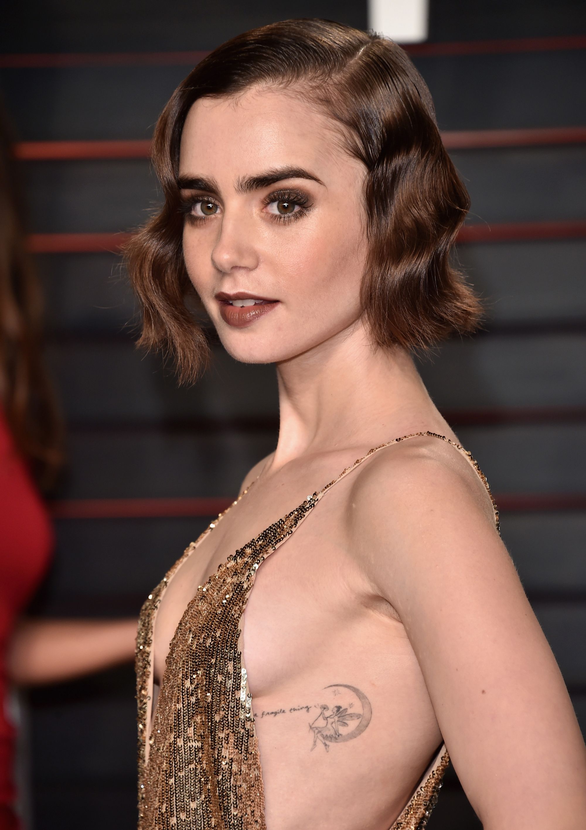 Lily Collins Just Got Another Tattoo  Teen Vogue