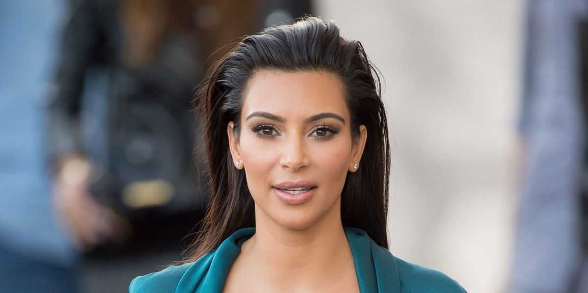 Kim Kardashian reveals passport photo and it's ridiculously stylish