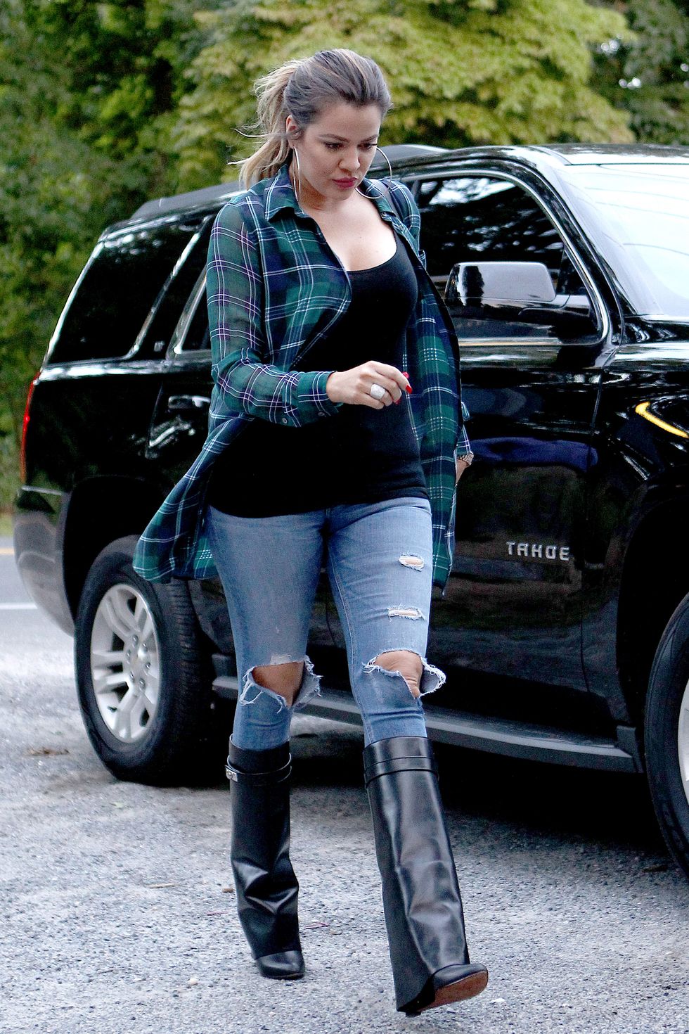 Khloe Kardashian wearing ripped jeans and check shirt - celebrity style photos - fashion - cosmopolitan.co.uk