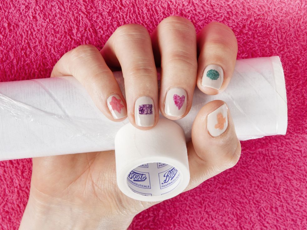 DIY nail art: How to do marble effect shapes using adhesive tape and cling film