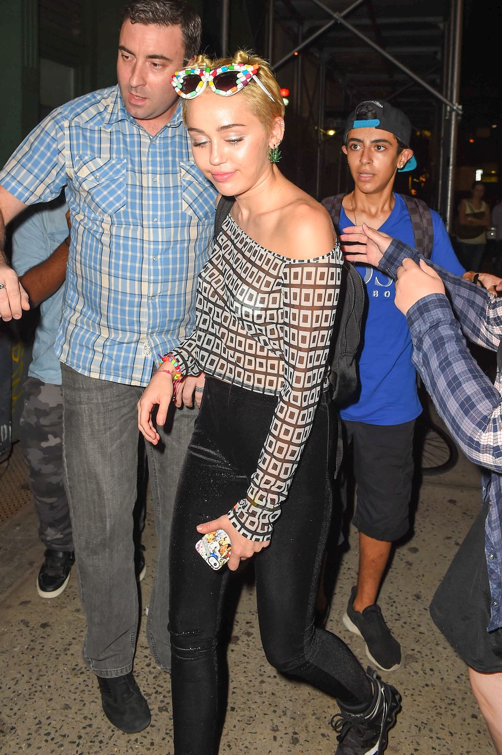 Miley Cyrus wearing ice cream nipple pasties