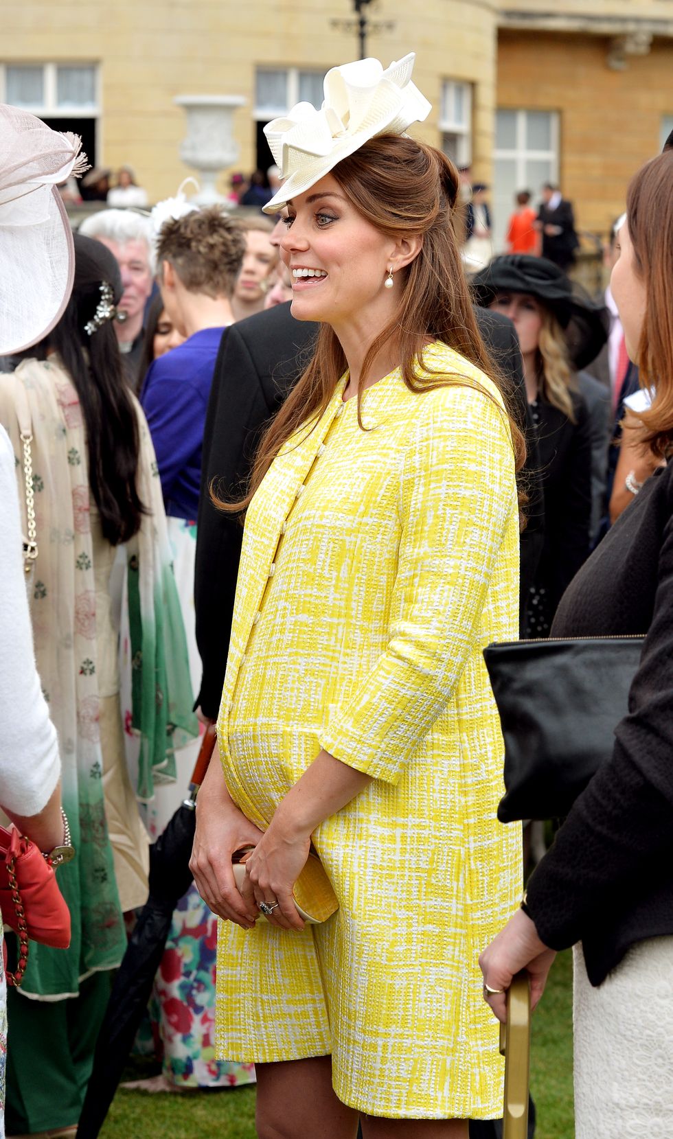 Duchess of Cambridge wearing an Emilia Wickstead yellow coat