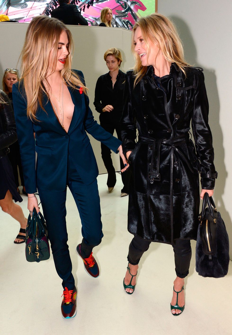 Cara Delevingne and Kate Moss arrive at Burberry Spring 2015