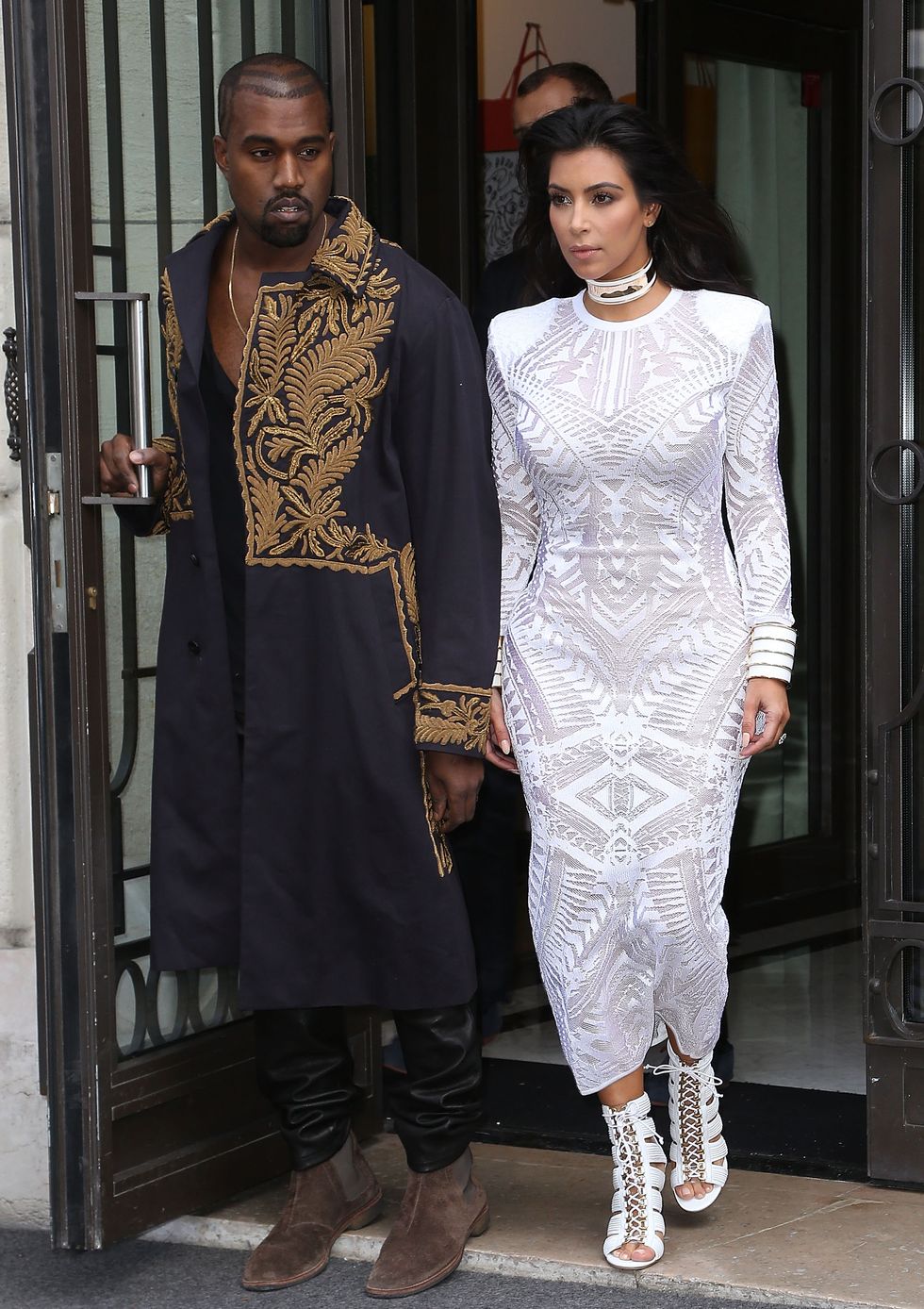 Kanye West and Kim Kardashian arriving at the Balmain Spring 2015 show
