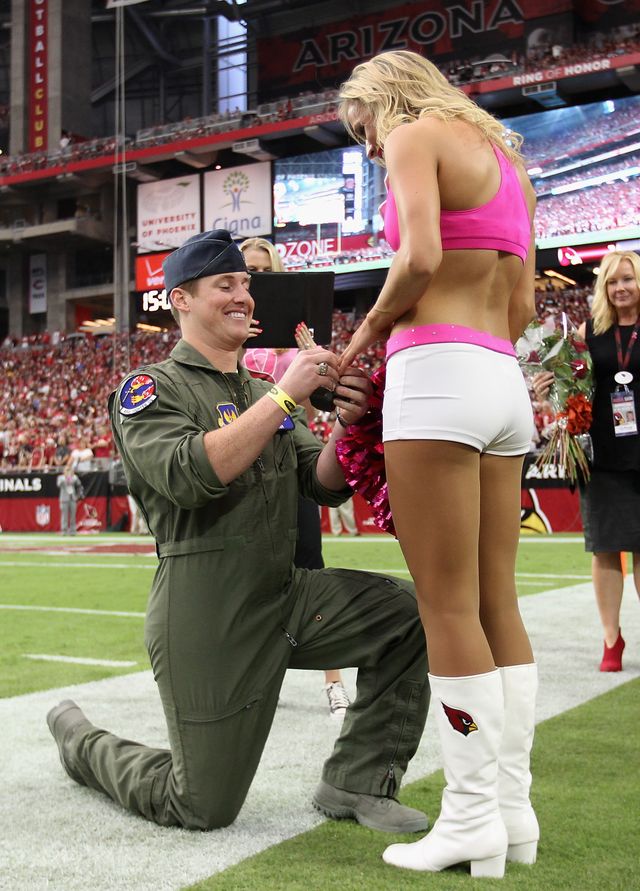This US Air Force Captain proposed to his cheerleading girlfriend in the middle of her NFL performance