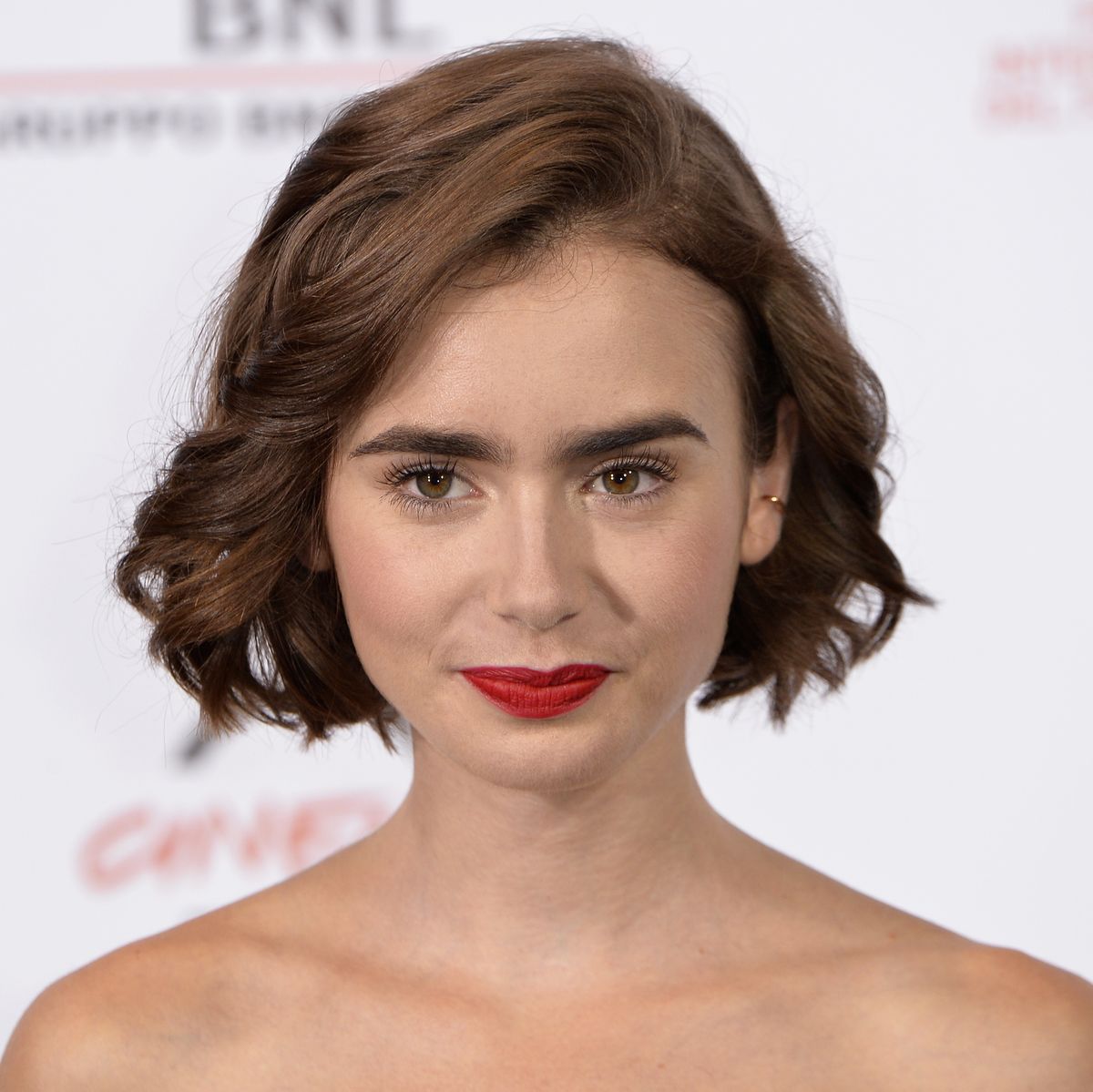 Lily Collins debuts 'mullet bangs' haircut and it's very 60s