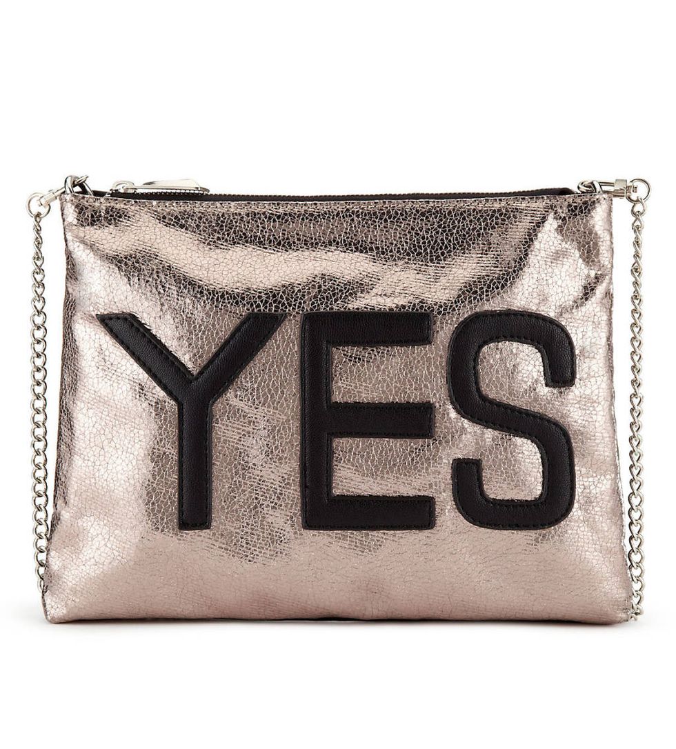 <a href="http://www.marksandspencer.com/-yes-and-no-slogan-clutch-bag/p/p22337177#" target="_blank">Yes and No Slogan Clutch Bag, £25, Marks & Spencer</a>