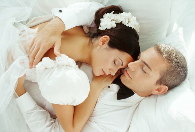Bride and groom asleep