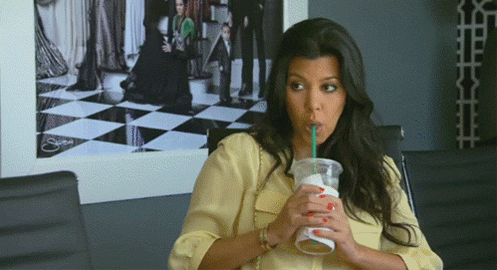 Kourtney Kardashian drinking coffee - 13 things you've already done if you're a Christmas freak - Cosmopolitan.co.uk