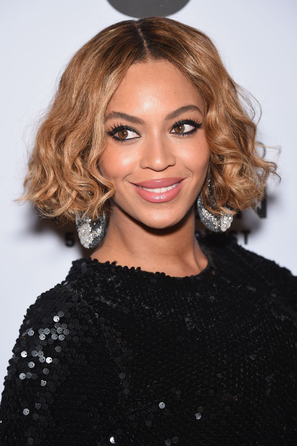 Beyonce looks smokin' in a black sequin LBD - and it's £68 from Topshop