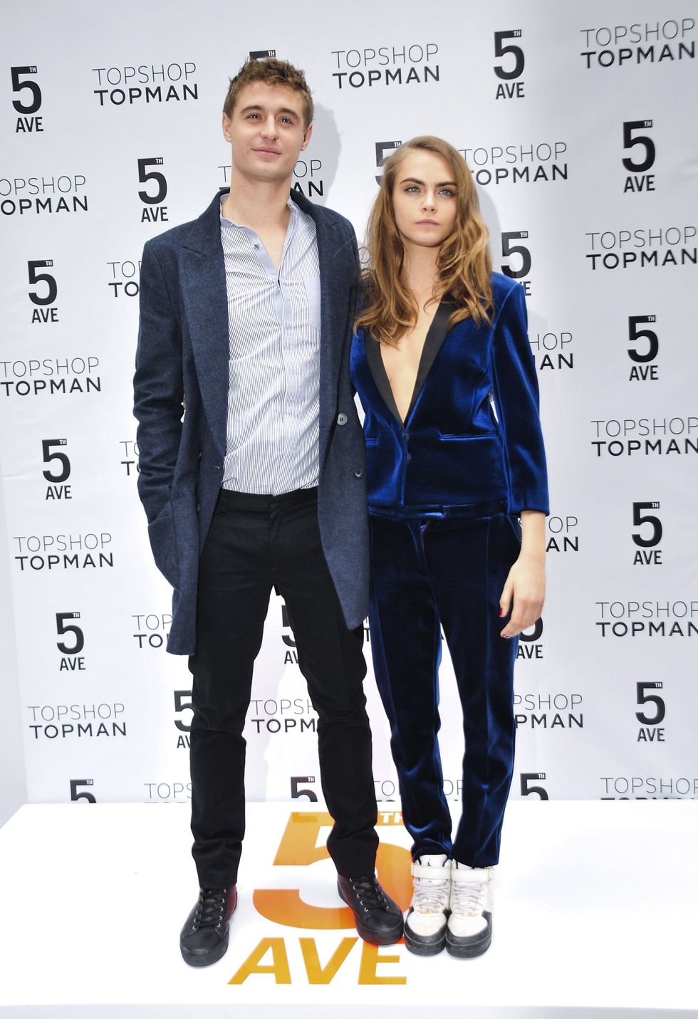 Cara Delevingne suits up in navy velvet for the Topshop launch in New York with Max Irons