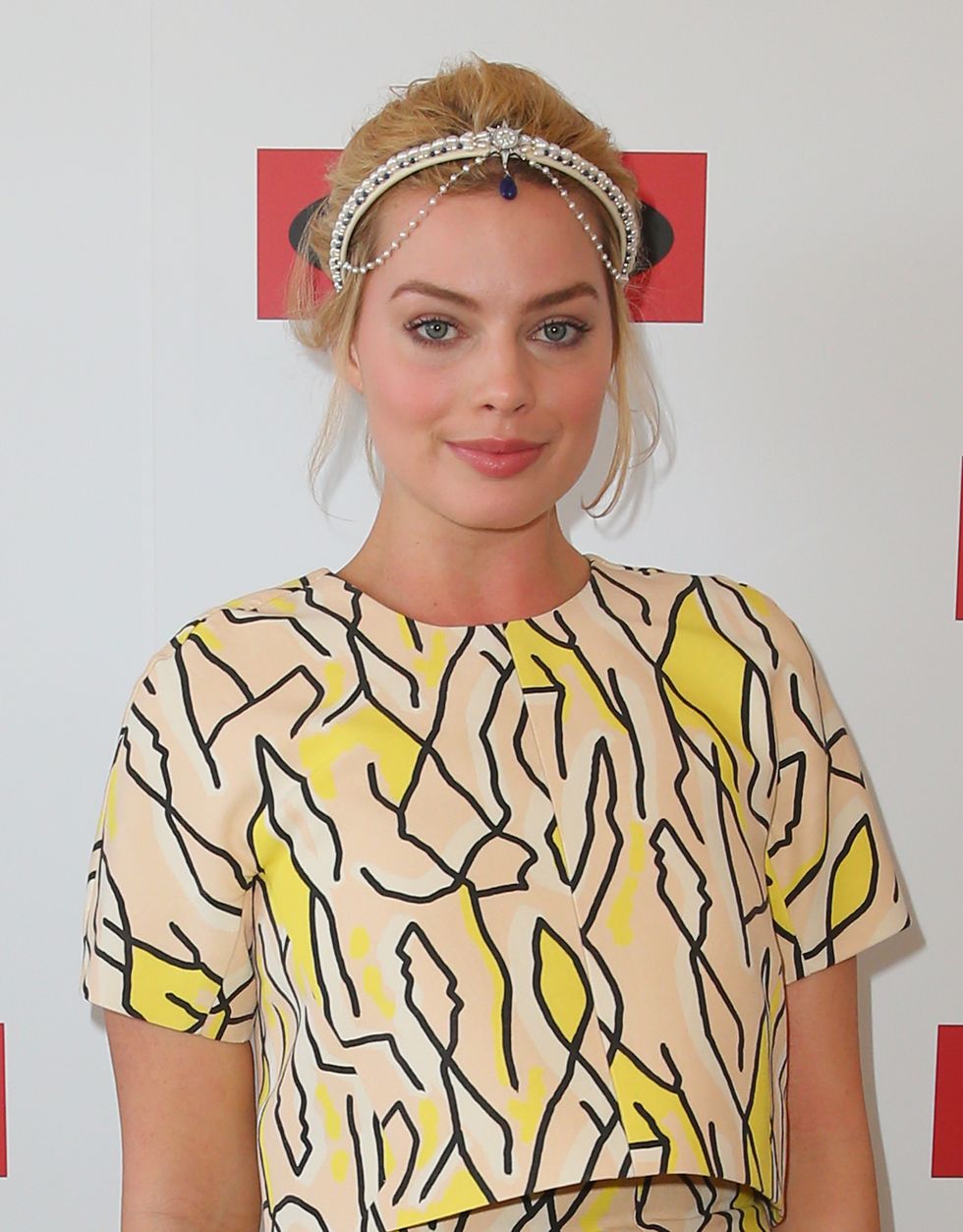 Margot Robbie works the hair accessory trend