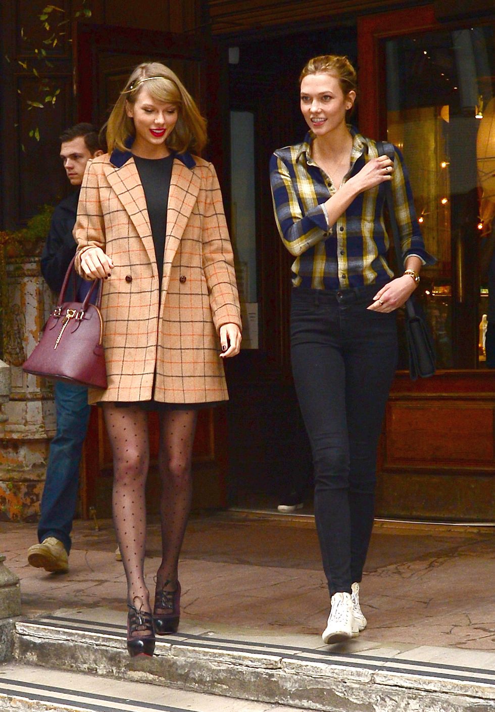 Taylor Swift and Karlie Kloss wearing matching check while out in New York