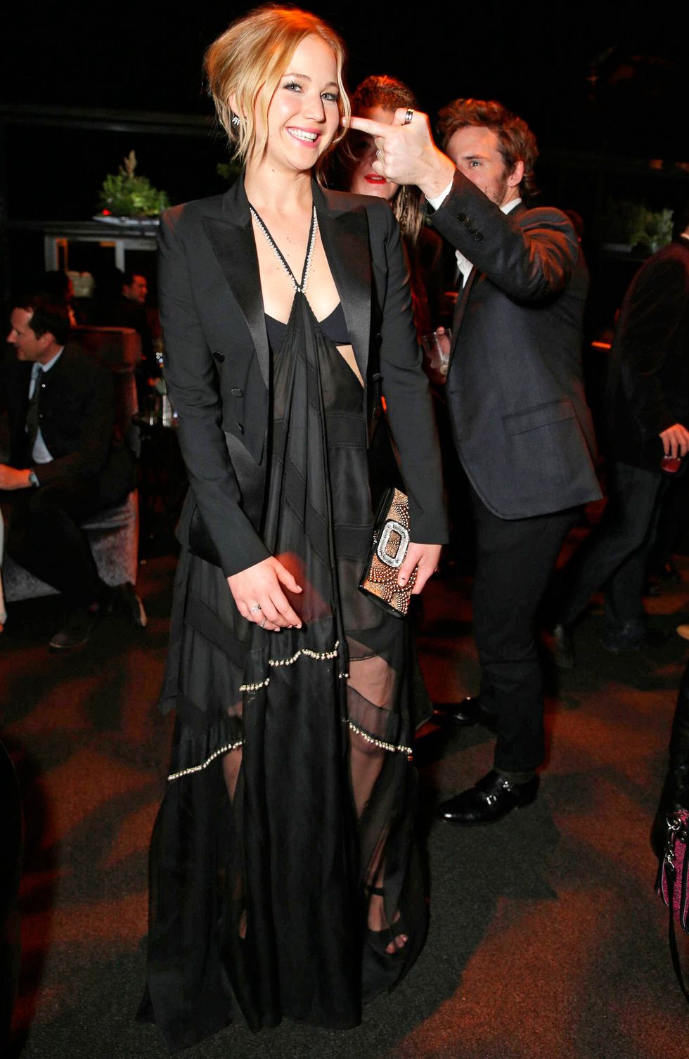 Jennifer Lawrence wearing a black sheer gown at the Hunger Games LA after party