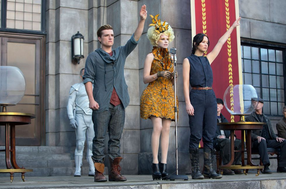 Cinemas in Bangkok banned from showing the Hunger Games after protesters use the three-fingered salute