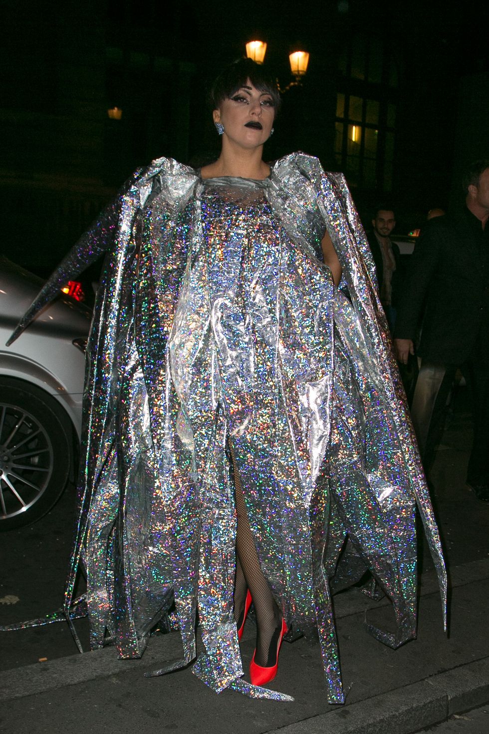 Lady Gaga wearing silver star costume