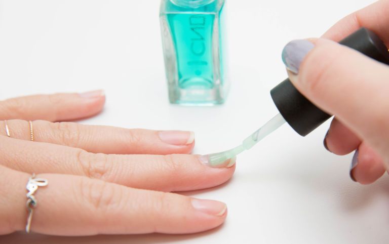 Apply a basecoat for a long-lasting manicure