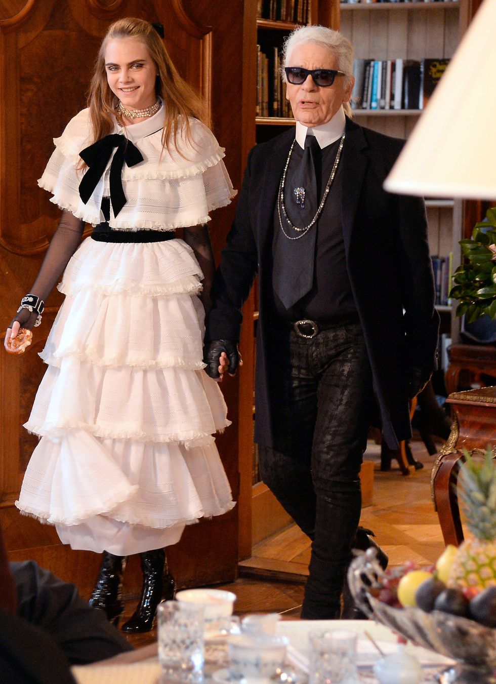 Cara Delevingne and Karl Lagerfeld at the Chanel Metiers d'Art Paris fashion show