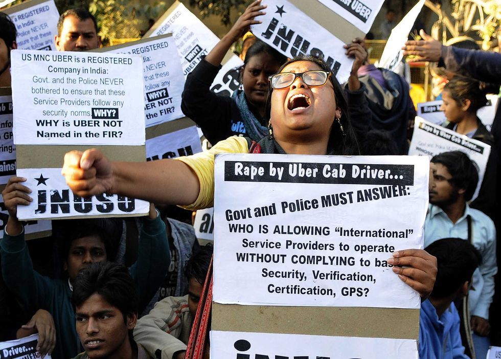 Students protest against Uber in New Delhi