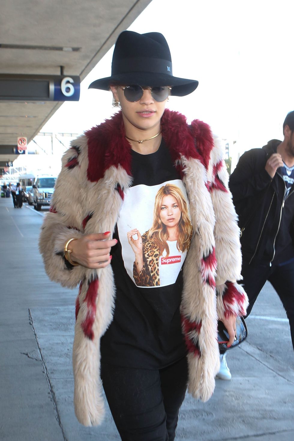 Rita Ora wears Kate Moss t-shirt in airport