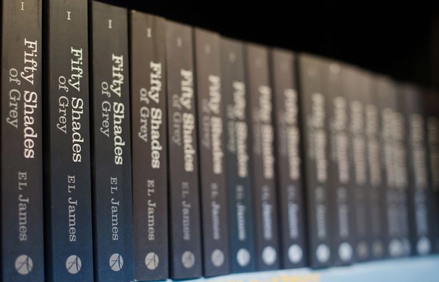 Fifty Shades of Grey books on shelf