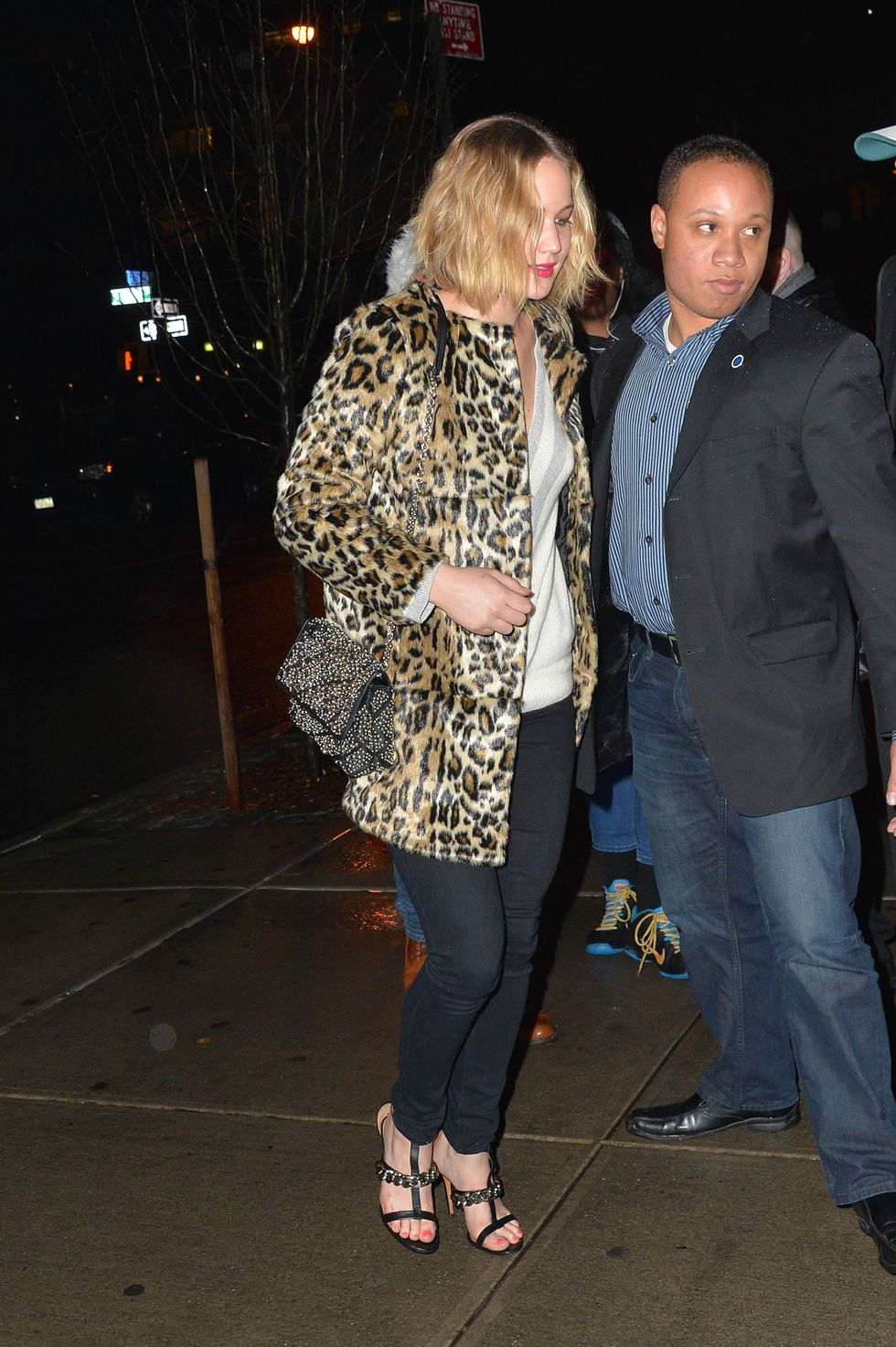 Jennifer Lawrence in New York wearing a leopard print jacket and jeans